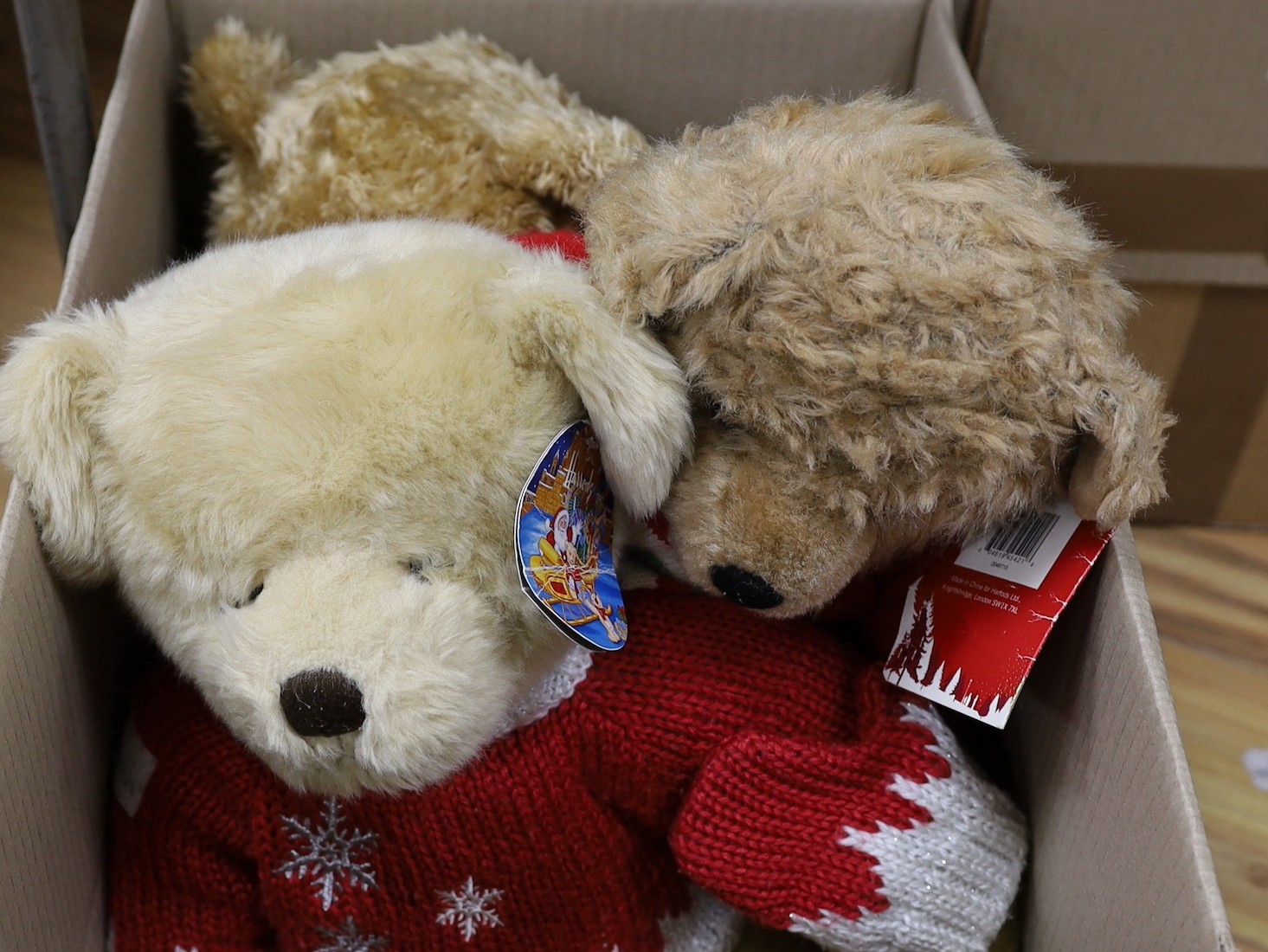 Four Harrods Bears, some dressed